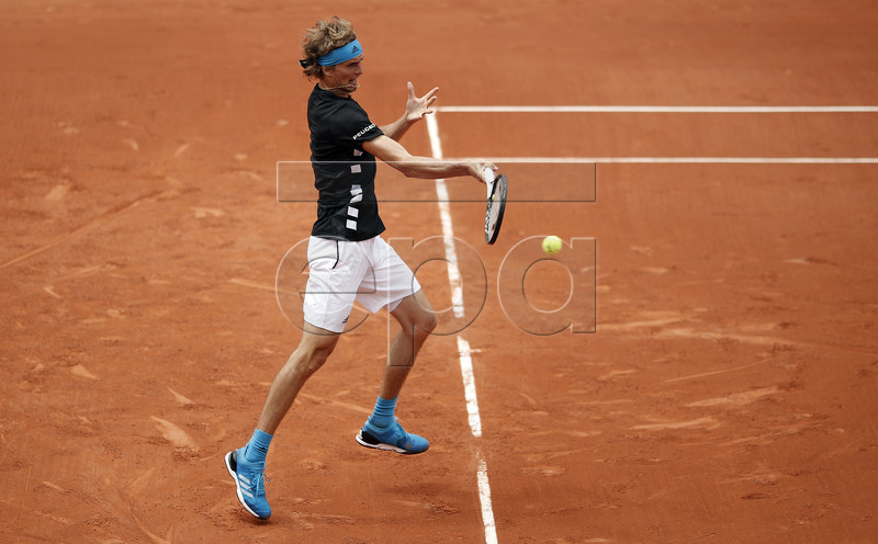 Alexander Zverev of Germany plays Mikael Ymer of Sweden during their men?s second round match during the French Open tennis tournament at Roland Garros in Paris, France, 30 May 2019. EPA-EFE/YOAN VALAT