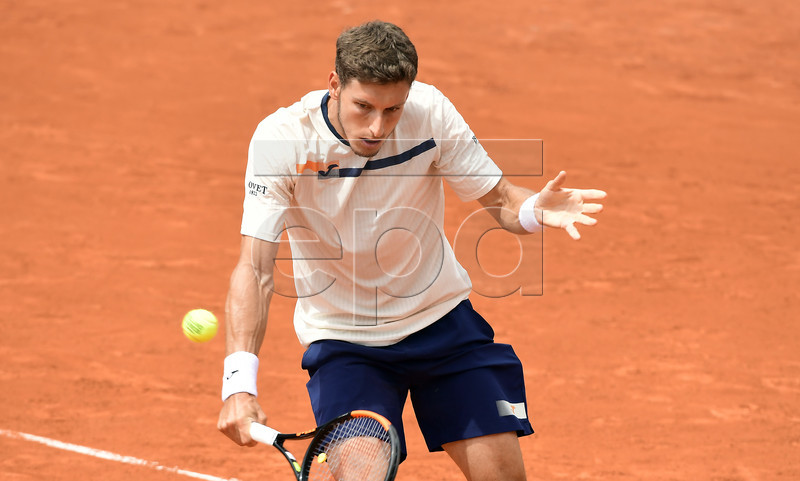 Pablo Carreno Busta of Spain plays Benoit Paire of France during their men?s third round match during the French Open tennis tournament at Roland Garros in Paris, France, 31 May 2019. EPA-EFE/CAROLINE BLUMBERG