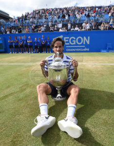 Feliciano Lopez of Spain poses with the trophy after winning his final match against Marin Cilic of Croatia during the Aegon Championships tennis tournament at the Queens Club in London, Britain, 25 June 2017.  EPA/FACUNDO ARRIZABALAGA