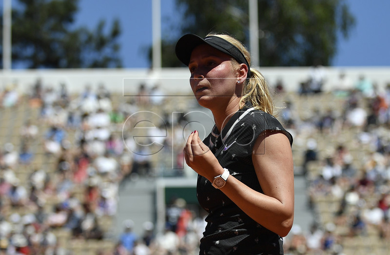 Donna Vekic of Croatia reacts as she plays Johanna Konta of Britain during their women?s round of 16 match during the French Open tennis tournament at Roland Garros in Paris, France, 02 June 2019. EPA-EFE/JULIEN DE ROSA
