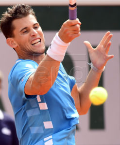 Dominic Thiem of Austria plays Gael Monfils of France during their men?s round of 16 match during the French Open tennis tournament at Roland Garros in Paris, France, 03 June 2019. EPA-EFE/CAROLINE BLUMBERG