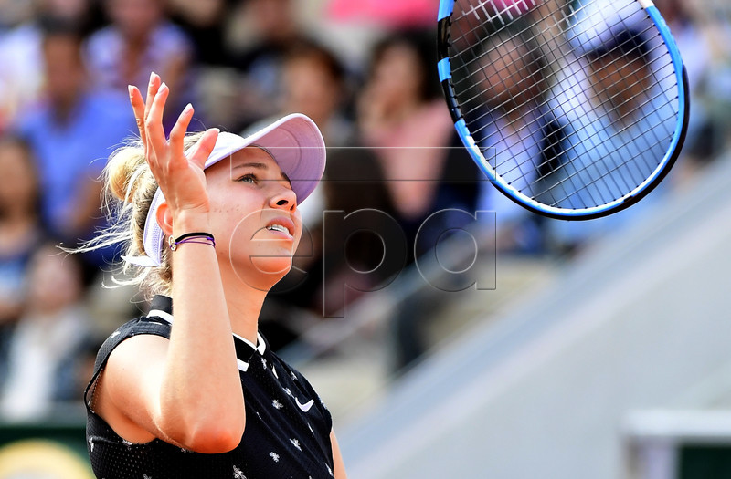 Amanda Anisimova of the USA reacts as she plays Aliona Bolsova of Spain during their women?s round of 16 match during the French Open tennis tournament at Roland Garros in Paris, France, 03 June 2019. EPA-EFE/CAROLINE BLUMBERG