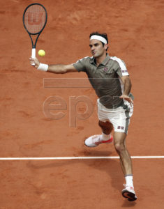 Roger Federer of Switzerland plays Stan Wawrinka of Switzerland during their men?s quarter final match during the French Open tennis tournament at Roland Garros in Paris, France, 04 June 2019. EPA-EFE/YOAN VALAT