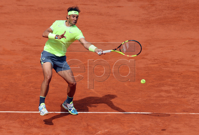 Rafael Nadal of Spain plays Kei Nishikori of Japan during their men?s quarter final match during the French Open tennis tournament at Roland Garros in Paris, France, 04 June 2019. EPA-EFE/SRDJAN SUKI