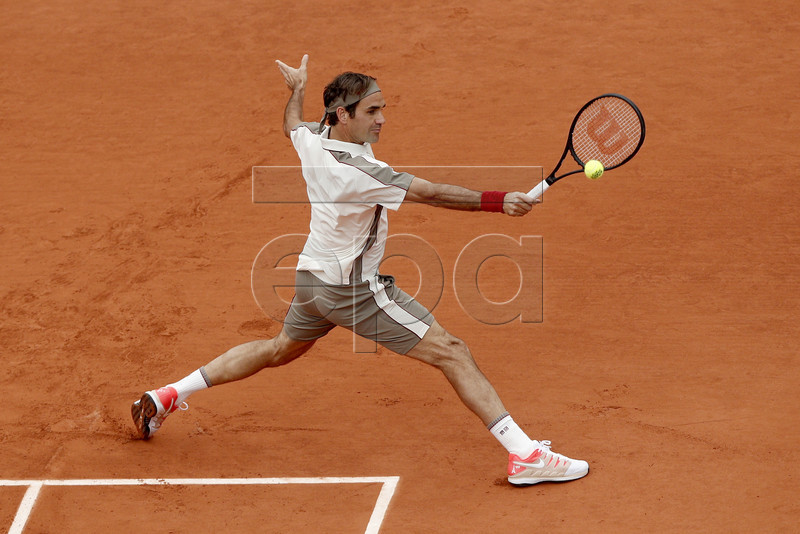 Roger Federer of Switzerland plays Rafael Nadal of Spain during their men?s semi final match during the French Open tennis tournament at Roland Garros in Paris, France, 07 June 2019. EPA-EFE/YOAN VALAT