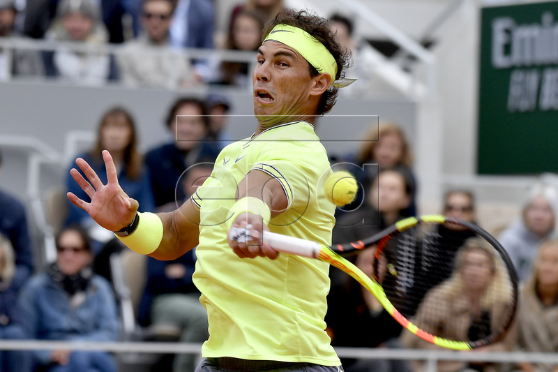 Rafael Nadal of Spain plays Roger Federer of Switzerland during their men?s semi final match during the French Open tennis tournament at Roland Garros in Paris, France, 07 June 2019. EPA-EFE/JULIEN DE ROSA