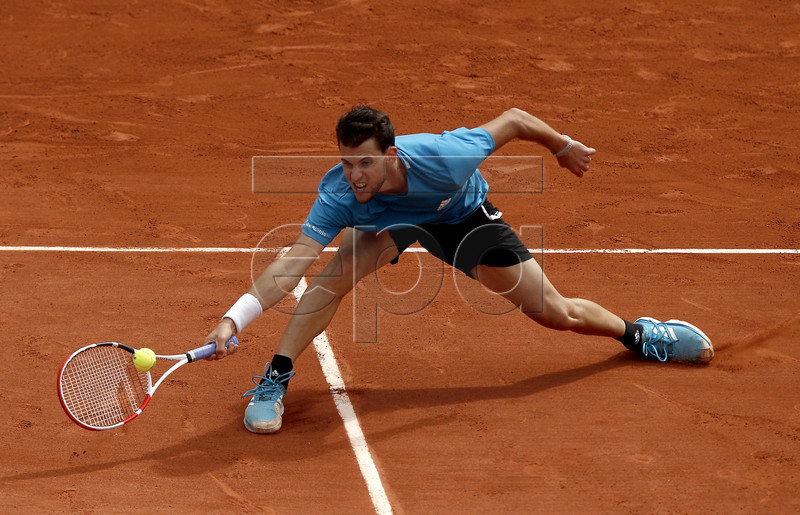 Dominic Thiem of Austria plays Rafael Nadal of Spain during their men?s final match during the French Open tennis tournament at Roland Garros in Paris, France, 09 June 2019. EPA-EFE/YOAN VALAT