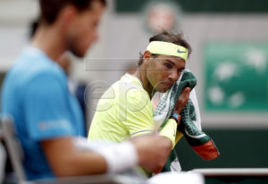 Rafael Nadal of Spain reacts during a break as he plays Dominic Thiem of Austria during their men?s final match during the French Open tennis tournament at Roland Garros in Paris, France, 09 June 2019. EPA-EFE/YOAN VALAT