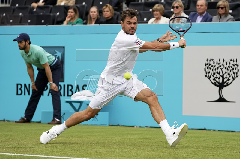 Switzerland's Stan Wawrinka in action during his round 32 match against Britain's Dan Evans at the Fever Tree Championship at Queen's Club in London, Britain, 19 June 2019. EPA-EFE/WILL OLIVER