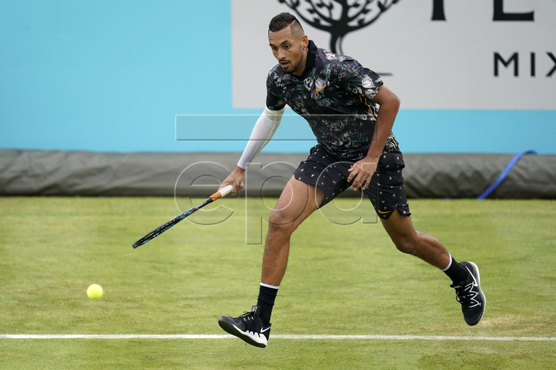 Australia's Nick Kyrgios returns to Spain's Roberto Carballes Baena during their round 32 match at the Fever Tree Championship at Queen's Club in London, Britain, 20 June 2019. EPA-EFE/WILL OLIVER