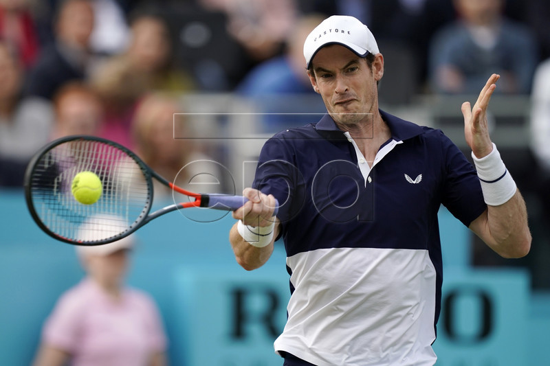 Britain's Andy Murray in action as he plays alongside Feliciano Lopez of Spain against Colombia's Robert Farah and Juan Sebastian Cabal in their round 16 mens doubles match at the Fever Tree Championship at Queen's Club in London, Britain, 20 June 2019. EPA-EFE/WILL OLIVER
