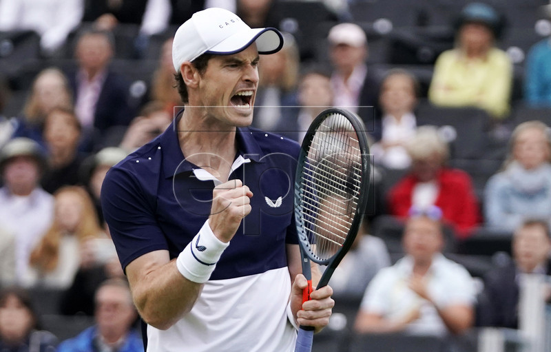 Britain's Andy Murray reacts as he plays alongside Feliciano Lopez of Spain against Colombia's Robert Farah and Juan Sebastian Cabal in their round 16 mens doubles match at the Fever Tree Championship at Queen's Club in London, Britain, 20 June 2019. EPA-EFE/WILL OLIVER