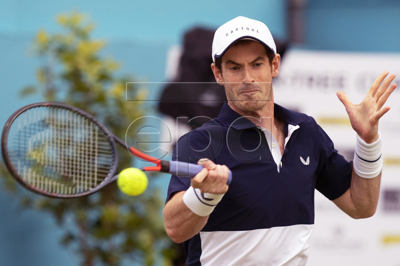 Britain's Andy Murray in action during his doubles quarter final match with Feliciano Lopez of Spain against Britain's Dan Evans and Ken Skupski at the Fever Tree Championship at Queen's Club in London, Britain, 21 June 2019. EPA-EFE/WILL OLIVER