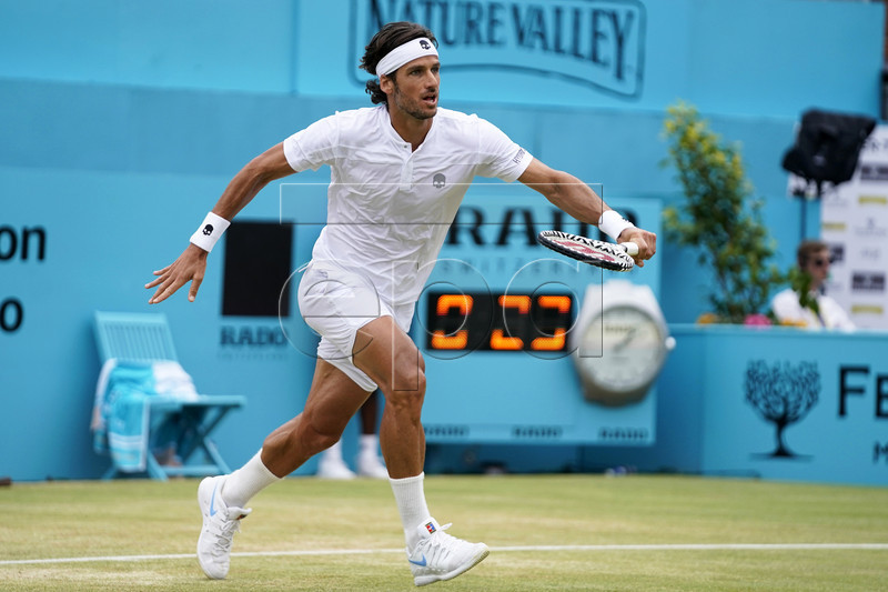 Spain's Feliciano Lopez in action against Gilles Simon of France during their final match at the Fever Tree Championship at Queen's Club in London, Britain, 23 June 2019. EPA-EFE/WILL OLIVER
