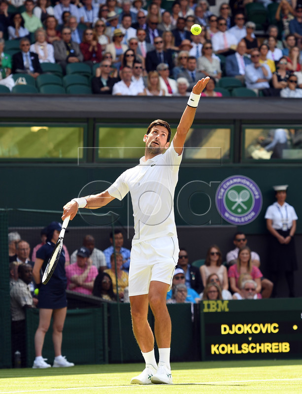 Novak Djokovic of Serbia serves to Philipp Kohlschreiber of Germany in their first round match during the Wimbledon Championships at the All England Lawn Tennis Club, in London, Britain, 01 July 2019. EPA-EFE/ANDY RAIN EDITORIAL USE ONLY/NO COMMERCIAL SALES