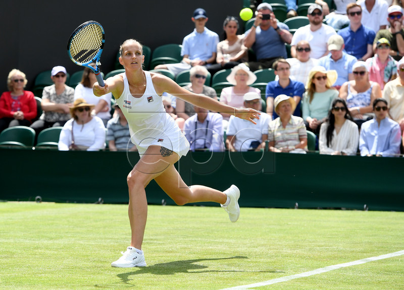Karolina Pliskova of Czech Republic in action against Lin Zhu of China during their first round match at the Wimbledon Championships at the All England Lawn Tennis Club, in London, Britain, 01 July 2019. EPA-EFE/FACUNDO ARRIZABALAGA EDITORIAL USE ONLY/NO COMMERCIAL SALES