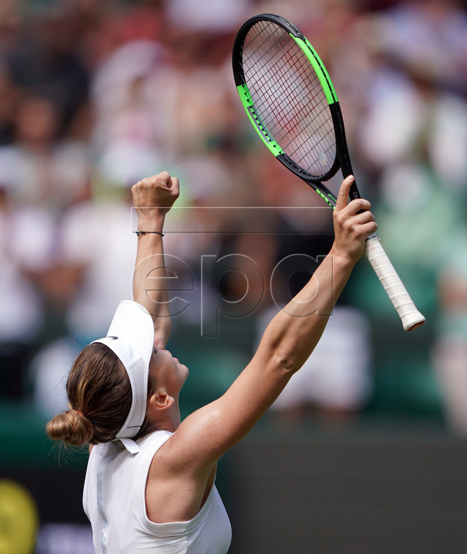 Simona Halep of Romania celebrates her straight set win over Aliaksandra Sasnovich of Belarus in their first round match during the Wimbledon Championships at the All England Lawn Tennis Club, in London, Britain, 01 July 2019. EPA-EFE/NIC BOTHMA EDITORIAL USE ONLY/NO COMMERCIAL SALES