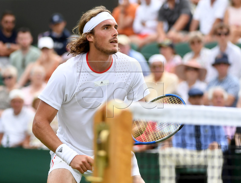 Stefanos Tsitsipas of Greece in action against Thomas Fabbiano of Italy during their first round match at the Wimbledon Championships at the All England Lawn Tennis Club, in London, Britain, 01 July 2019. EPA-EFE/FACUNDO ARRIZABALAGA EDITORIAL USE ONLY/NO COMMERCIAL SALES