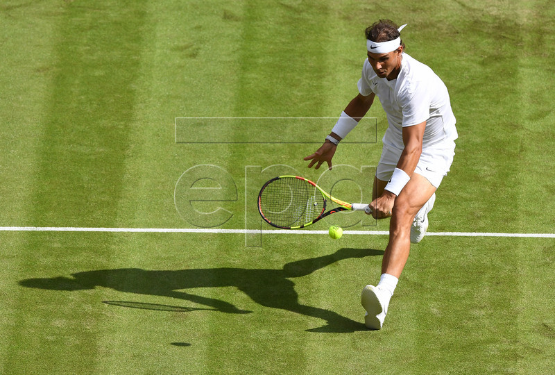 Rafael Nadal of Spain returns to Yuichi Sugita of Japan in their first round match during the Wimbledon Championships at the All England Lawn Tennis Club, in London, Britain, 02 July 2019. EPA-EFE/FACUNDO ARRIZABALAGA EDITORIAL USE ONLY/NO COMMERCIAL SALES