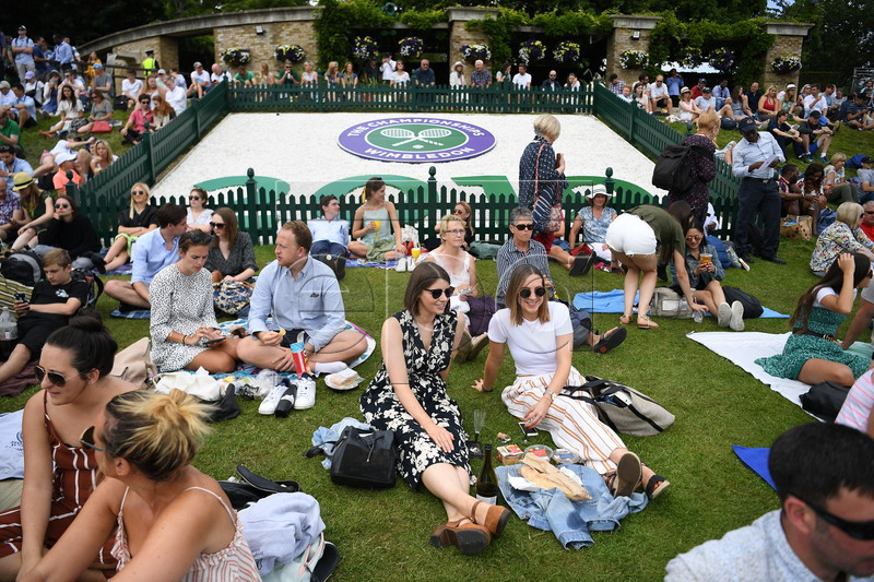 Spectators on the grounds on day three of the Wimbledon Championships at the All England Lawn Tennis Club, in London, Britain, 03 July 2019. EPA-EFE/ANDY RAIN EDITORIAL USE ONLY/NO COMMERCIAL SALES