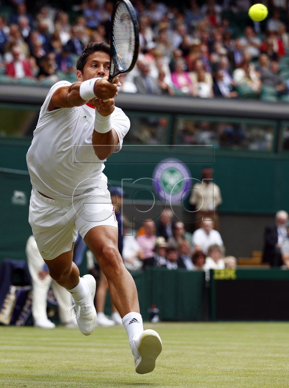 Fernando Verdasco of Spain returns to Kyle Edmund of Britain in their second round match during the Wimbledon Championships at the All England Lawn Tennis Club, in London, Britain, 03 July 2019. EPA-EFE/NIC BOTHMA EDITORIAL USE ONLY/NO COMMERCIAL SALES