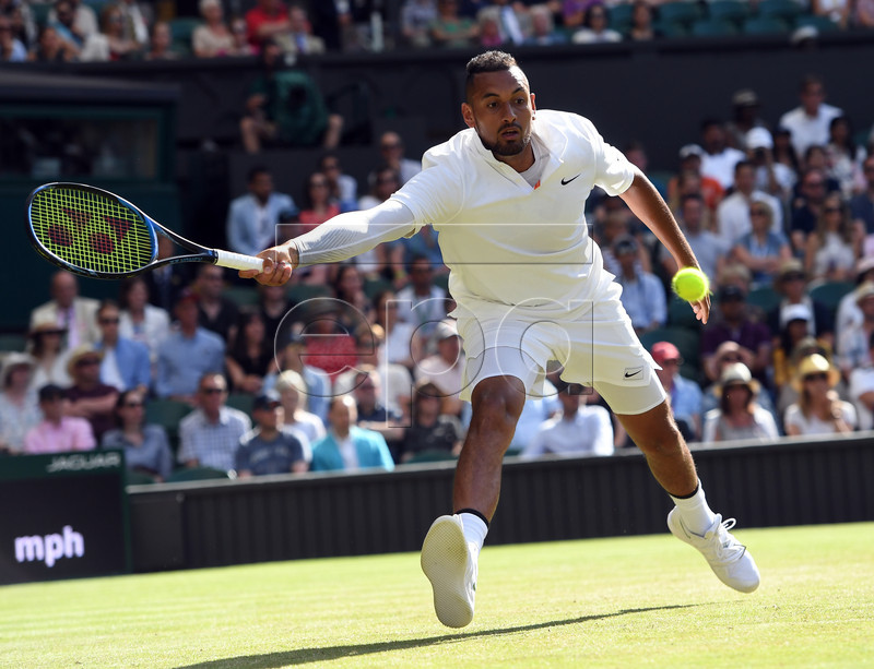 Nick Kyrgios of Australia returns to Rafael Nadal of Spain in their second round match during the Wimbledon Championships at the All England Lawn Tennis Club, in London, Britain, 04 July 2019. EPA-EFE/FACUNDO ARRIZABALAGA EDITORIAL USE ONLY/NO COMMERCIAL SALES