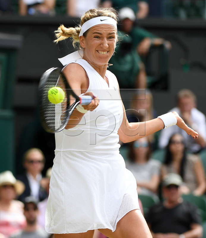 Victoria Azarenka of Belarus in action against Simona Halep of Romania during their third round match for the Wimbledon Championships at the All England Lawn Tennis Club, in London, Britain, 05 July 2019. EPA-EFE/ANDY RAIN EDITORIAL USE ONLY/NO COMMERCIAL SALES