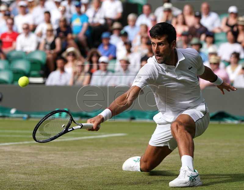 Novak Djokovic of Serbia in action against Hubert Hurkacz of Poland during their third round match at the Wimbledon Championships at the All England Lawn Tennis Club, in London, Britain, 05 July 2019. EPA-EFE/NIC BOTHMA EDITORIAL USE ONLY/NO COMMERCIAL SALES