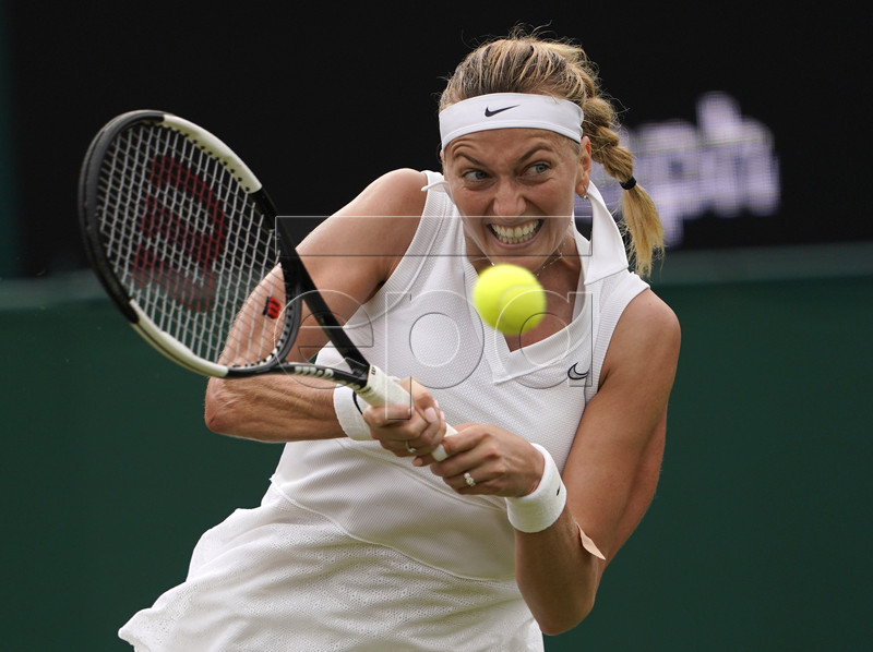Petra Kvitova of the Czech Republic in action against Magda Linette of Poland during their third round match at the Wimbledon Championships at the All England Lawn Tennis Club, in London, Britain, 06 July 2019. EPA-EFE/NIC BOTHMA EDITORIAL USE ONLY/NO COMMERCIAL SALES