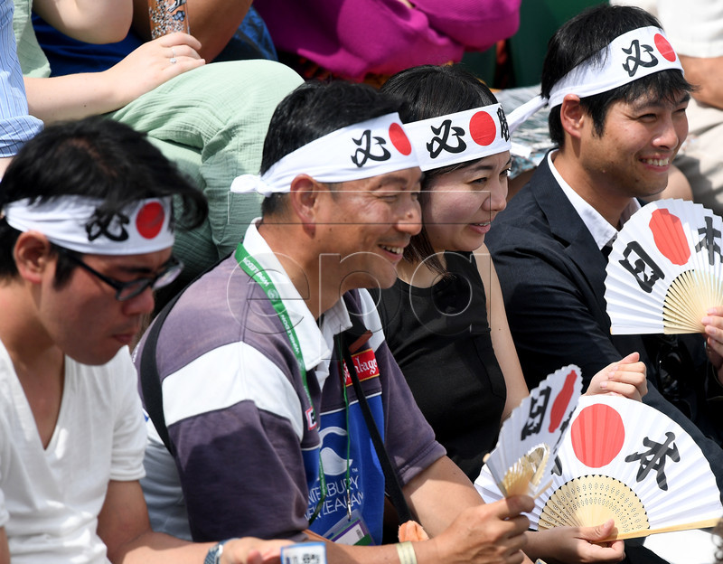 Supporters of Kei Nishikori of Japan cheer during his third round match against Steve Johnson of the USA at the Wimbledon Championships at the All England Lawn Tennis Club, in London, Britain, 06 July 2019. EPA-EFE/ANDY RAIN EDITORIAL USE ONLY/NO COMMERCIAL SALES