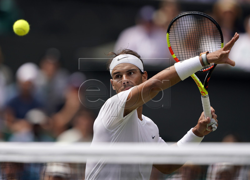 Rafael Nadal of Spain returns to Joao Sousa of Portugal in their fourth round match during the Wimbledon Championships at the All England Lawn Tennis Club, in London, Britain, 08 July 2019. EPA-EFE/NIC BOTHMA EDITORIAL USE ONLY/NO COMMERCIAL SALES