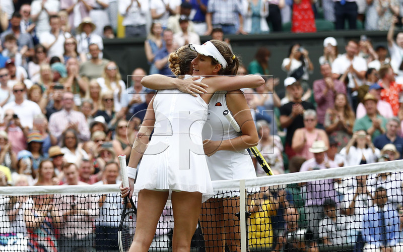 Johanna Konta of Britain (R) at the net with Petra Kvitova of the Czech Republic whom she defeated in their fourth round match during the Wimbledon Championships at the All England Lawn Tennis Club, in London, Britain, 08 July 2019. EPA-EFE/NIC BOTHMA EDITORIAL USE ONLY/NO COMMERCIAL SALES
