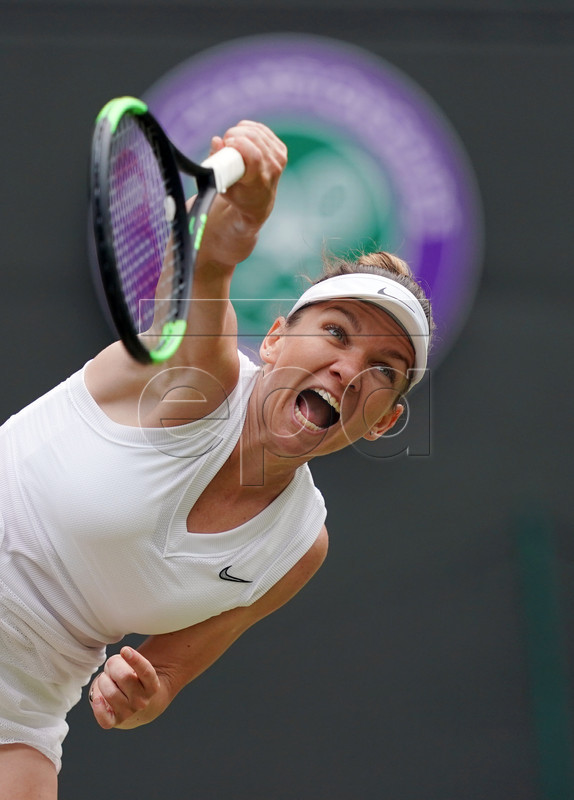 Simona Halep of Romania serves to Shuai Zhang of China in their quarter final match during the Wimbledon Championships at the All England Lawn Tennis Club, in London, Britain, 09 July 2019. EPA-EFE/WILL OLIVER EDITORIAL USE ONLY/NO COMMERCIAL SALES