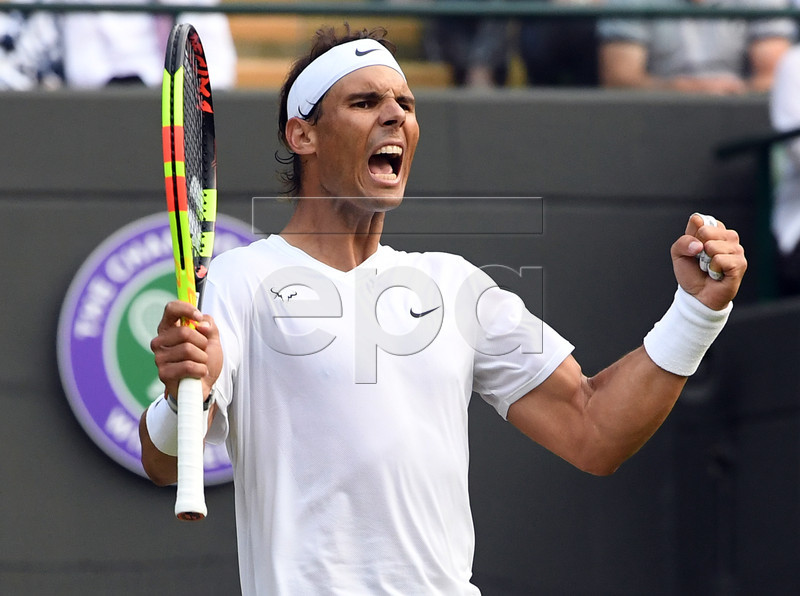 Rafael Nadal of Spain celebrates his win over Sam Querrey of the US in their quarter final match during the Wimbledon Championships at the All England Lawn Tennis Club, in London, Britain, 10 July 2019. EPA-EFE/FACUNDO ARRIZABALAGA EDITORIAL USE ONLY/NO COMMERCIAL SALES