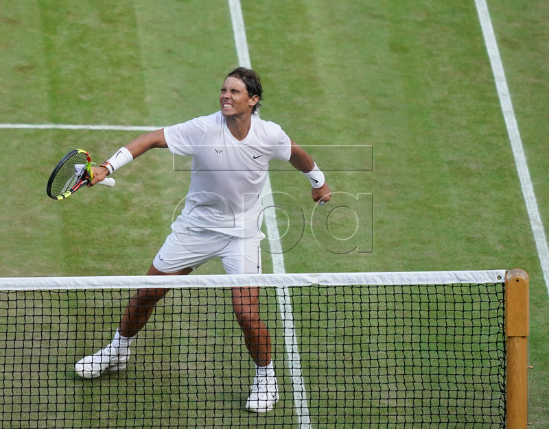 Rafael Nadal of Spain celebrates winning against Sam Querrey of the USA in their quarter final match during the Wimbledon Championships at the All England Lawn Tennis Club, in London, Britain, 10 July 2019. EPA-EFE/WILL OLIVER EDITORIAL US