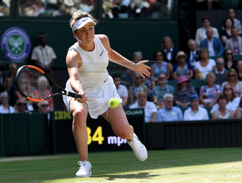 Elina Svitolina of Ukraine in action against Simona Halep of Romania during their semi final match for the Wimbledon Championships at the All England Lawn Tennis Club, in London, Britain, 11 July 2019. EPA-EFE/ANDY RAIN EDITORIAL USE ONLY/NO COMMERCIAL SALES