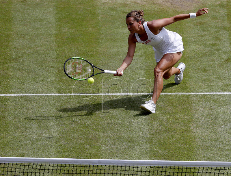 Barbora Strycova of the Czech Republic in action against Serena Williams of the USA during their semi final match for the Wimbledon Championships at the All England Lawn Tennis Club, in London, Britain, 11 July 2019. EPA-EFE/Alastair Grant / POOL EDITORIAL USE ONLY/NO COMMERCIAL SALES