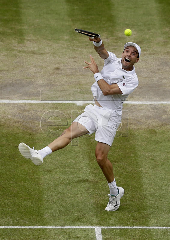 Roberto Bautista Agut of Spain in action against Novak Djokovic of Serbia during their semi final match for the Wimbledon Championships at the All England Lawn Tennis Club, in London, Britain, 12 July 2019. EPA-EFE/Tim Ireland / POOL EDITORIAL USE ONLY/NO COMMERCIAL SALES