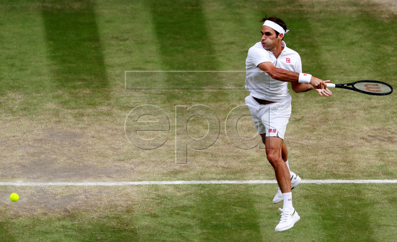 Roger Federer of Switzerland in action against Rafael Nadal of Spain during their semi final match for the Wimbledon Championships at the All England Lawn Tennis Club, in London, Britain, 12 July 2019. EPA-EFE/ANDREW COULDRIDGE / POOL EDITORIAL USE ONLY/NO COMMERCIAL SALES