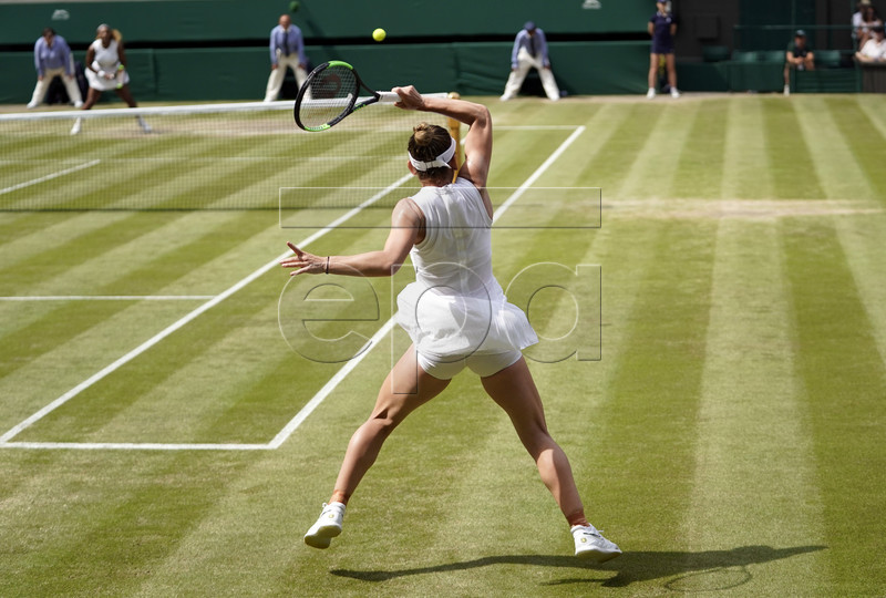 Simona Halep of Romania returns to Serena Williams of the US in the women's final of the Wimbledon Championships at the All England Lawn Tennis Club, in London, Britain, 13 July 2019. EPA-EFE/WILL OLIVER EDITORIAL USE ONLY/NO COMMERCIAL SALES